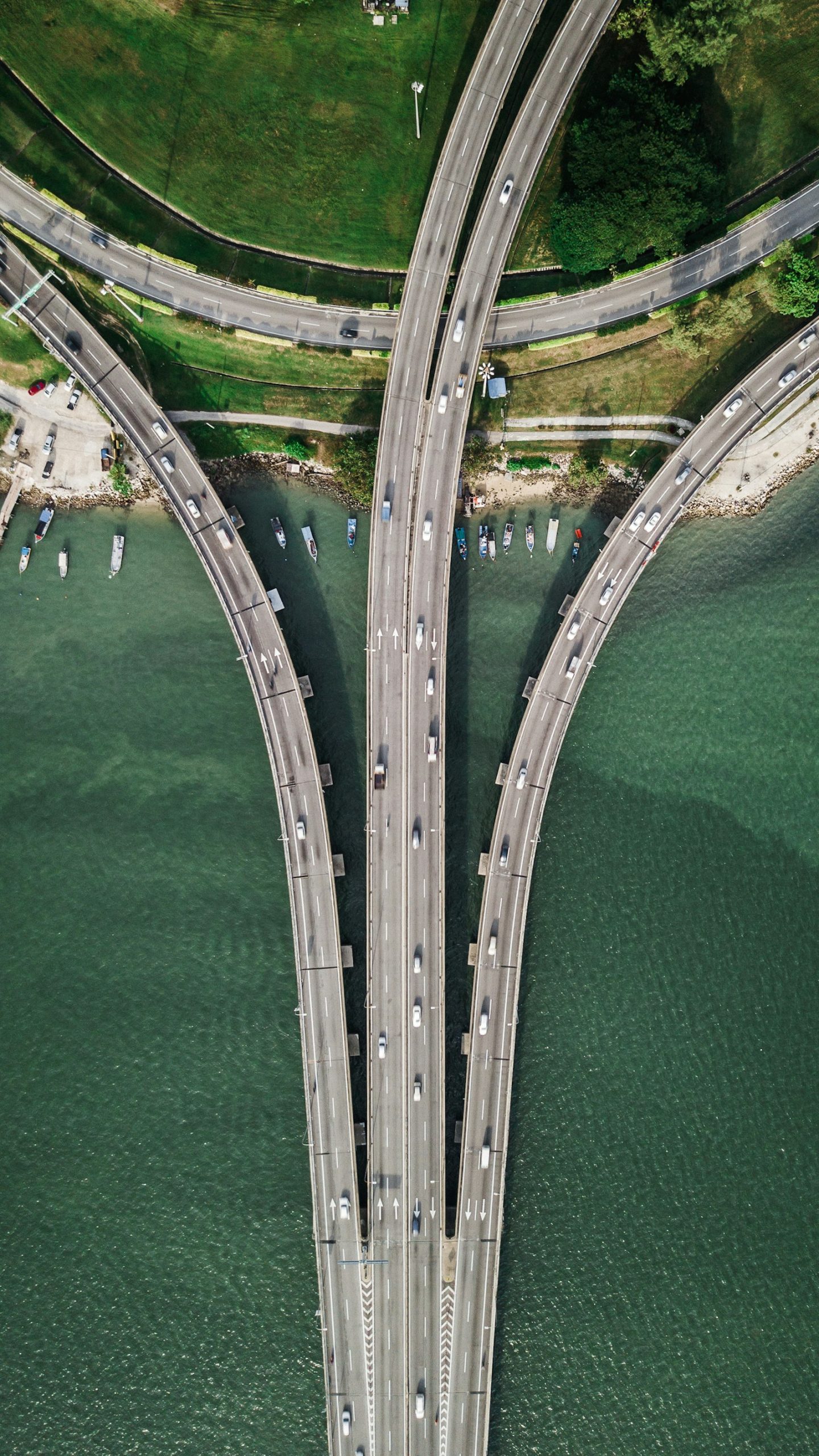 Aerial view of a highway interchange. Photo by Fahrul Azmi on Unsplash, used under the free Unsplash License.