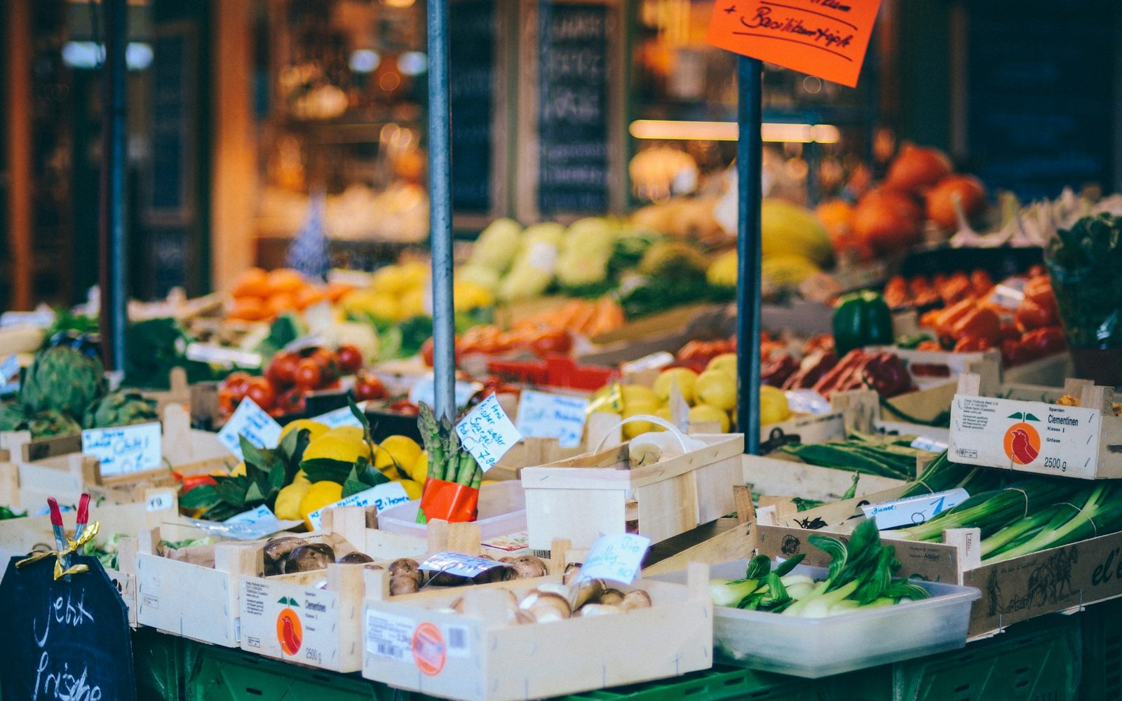 A market stall full of fresh fruit and vegetables